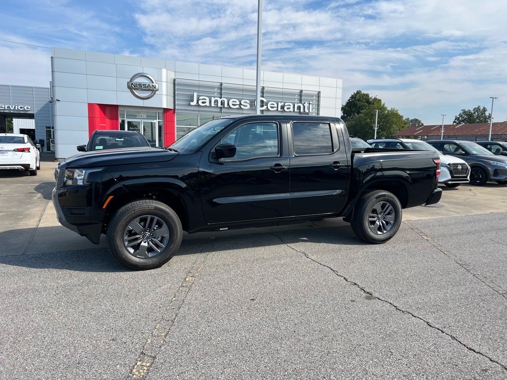 2025 Nissan Frontier Crew Cab SV in Super Black — front three-quarter view