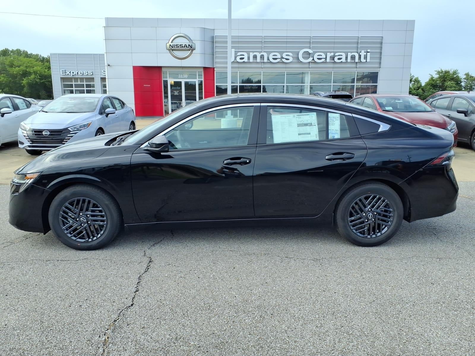 2026 Nissan Sentra SV in Super Black Kh3 — front three-quarter view