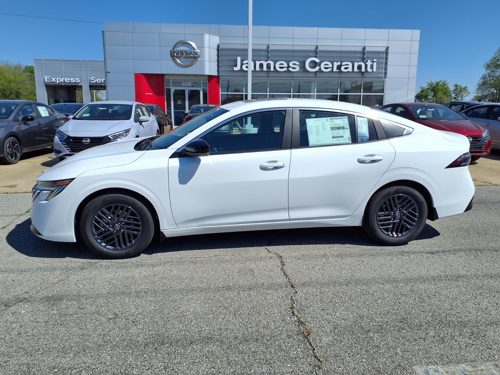 2026 Nissan Sentra SV in Fresh Powder Qm1 — front three-quarter view