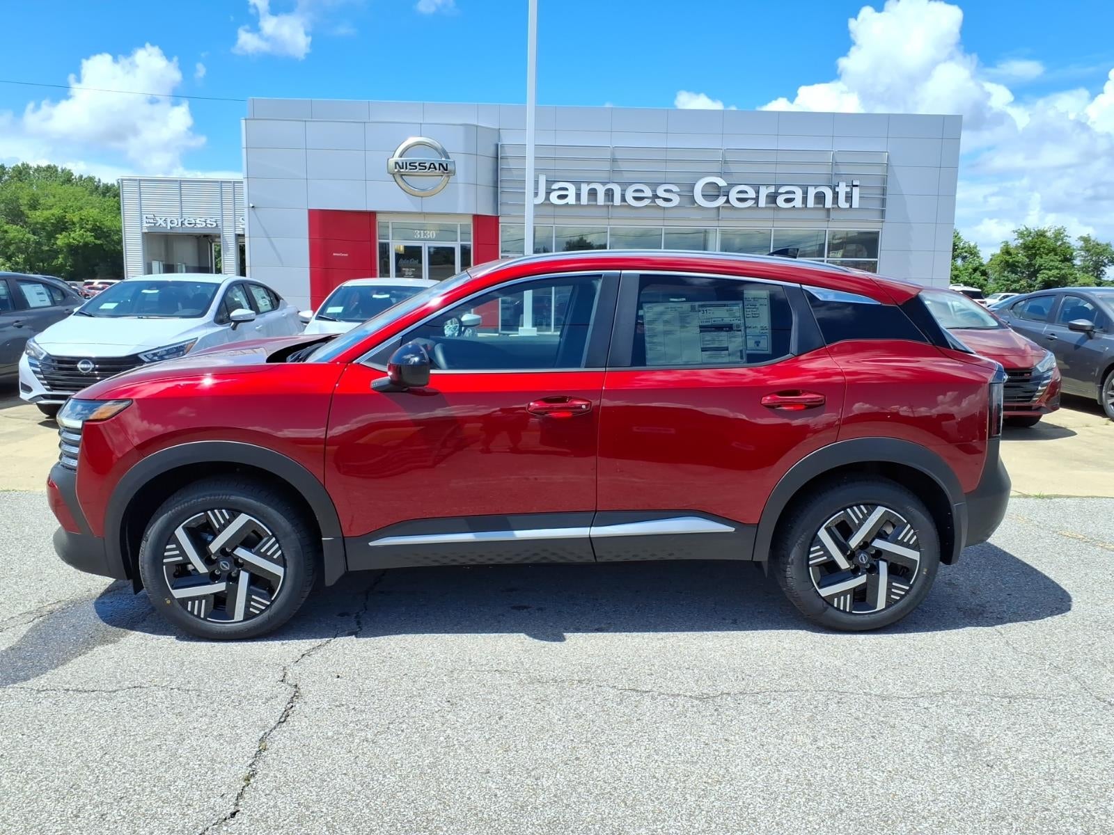2026 Nissan Kicks SV in Scarlet Ember Tintcoat Nbl — front three-quarter view